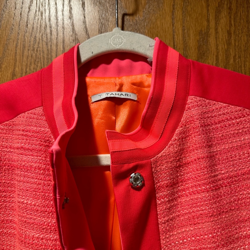 Beautiful orange and pink blazer.
